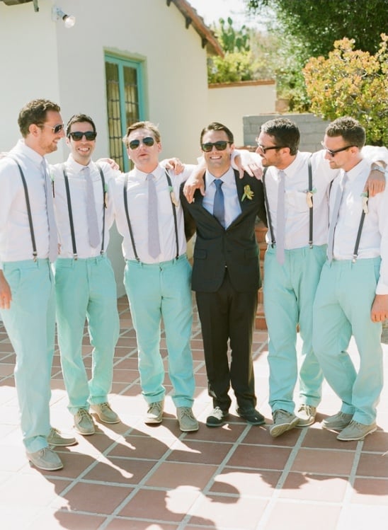 groomsman in mint pants