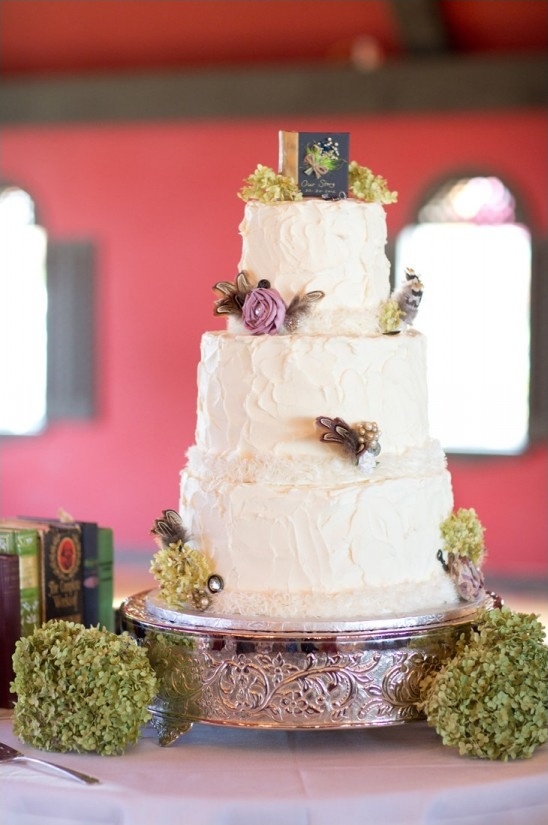 hydrangea and book topped wedding cake