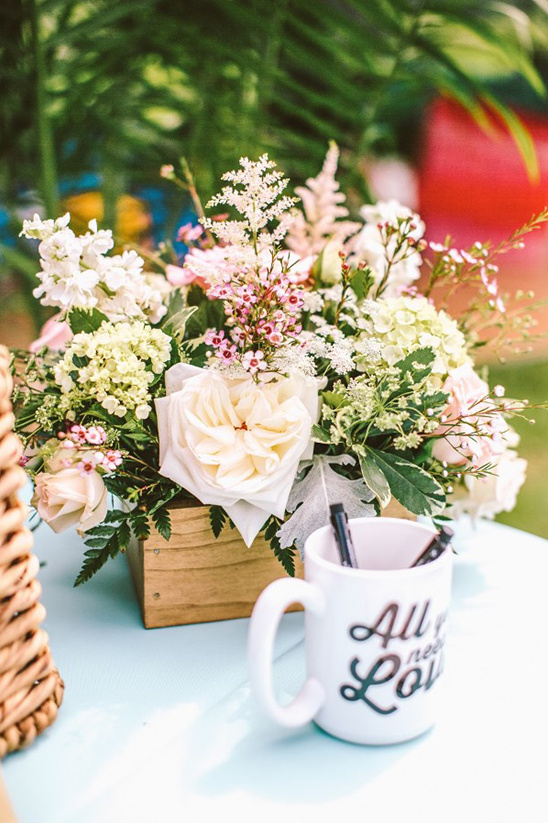 pretty floral arrangement in wooden box