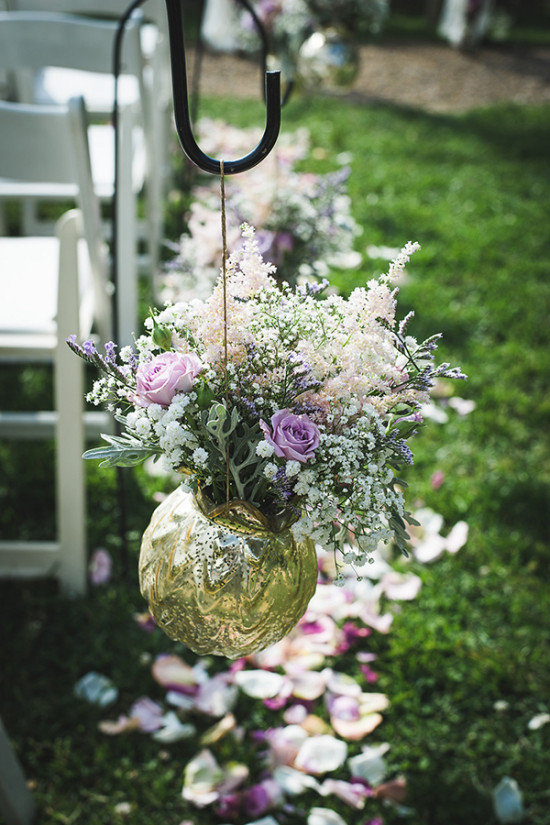 Purple and ivory aisle decor