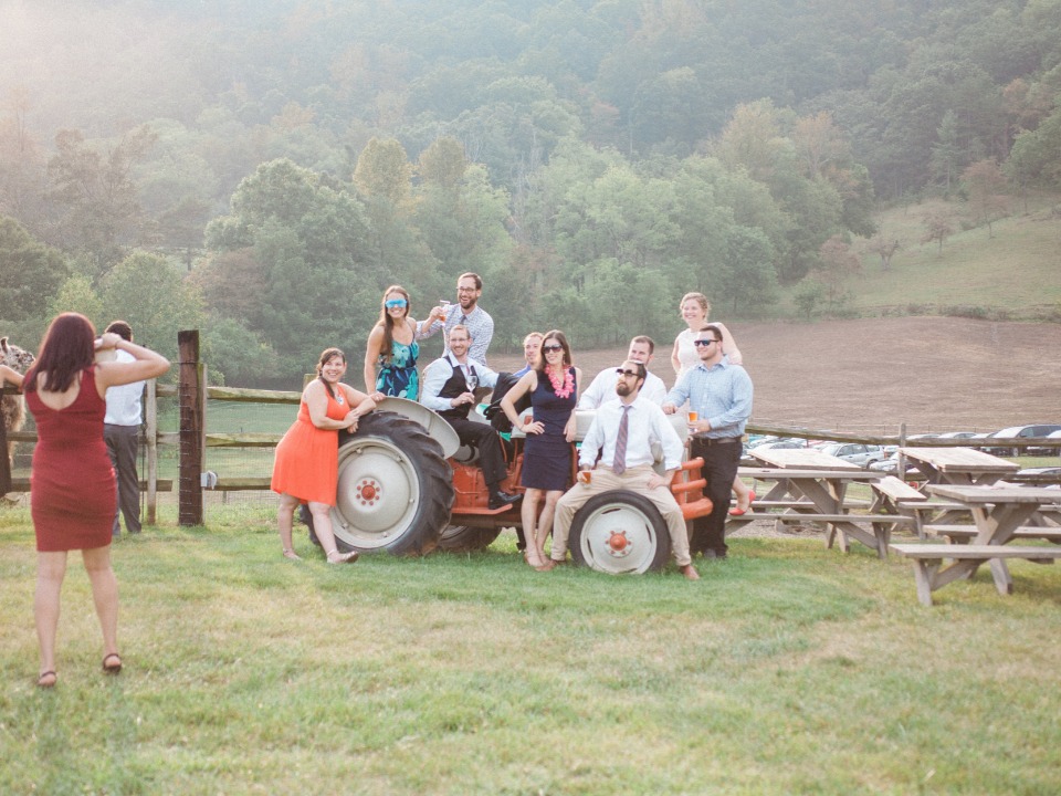 rustic photo booth idea with antique tractor