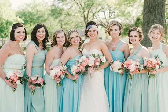 bridesmaids in assorted blue dresses