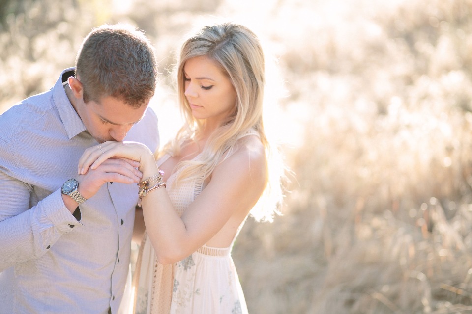 sweet engagement couple pose