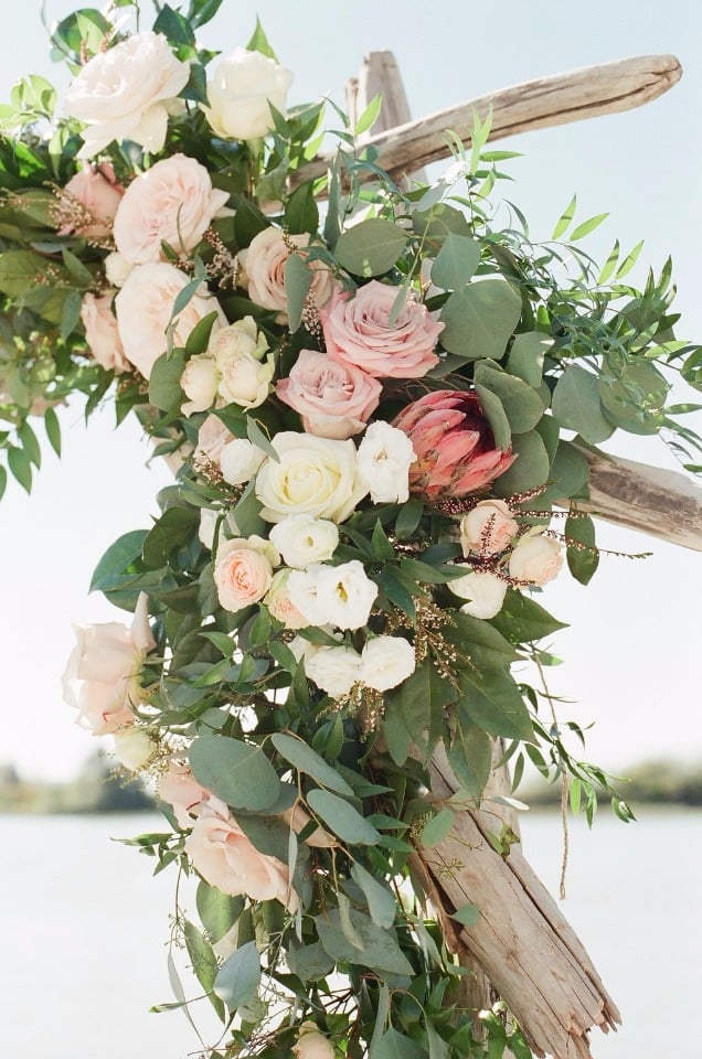 floral accent detail of driftwood arch