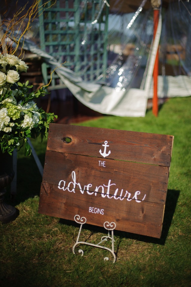 the adventure begins wedding sign