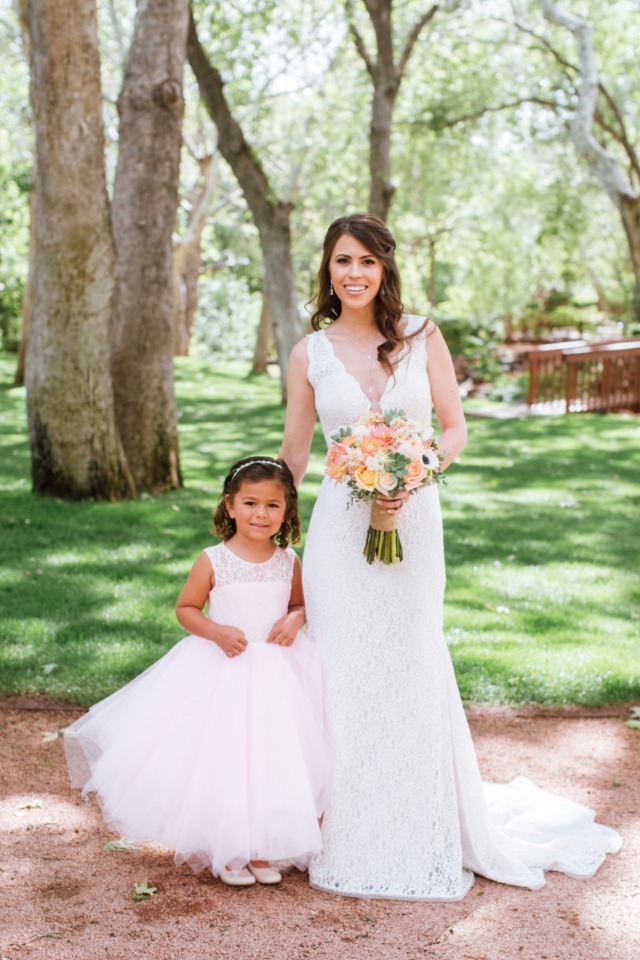 bride and her cute little flower girl