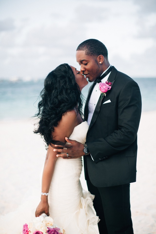 beach wedding kiss