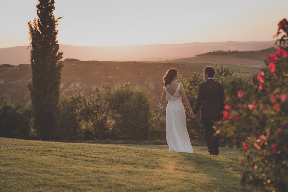 hand in hand at sunset