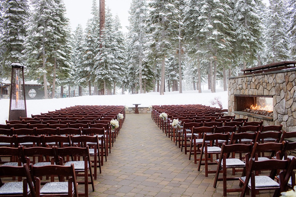 The Fireside Terrace- outdoor terrace situated in our backyard features a beautiful large stone hearth fireplace