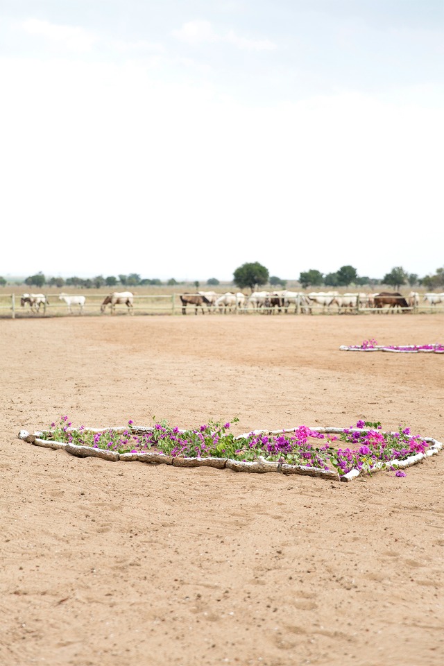 giant floral hearts leading to the wedding ceremony