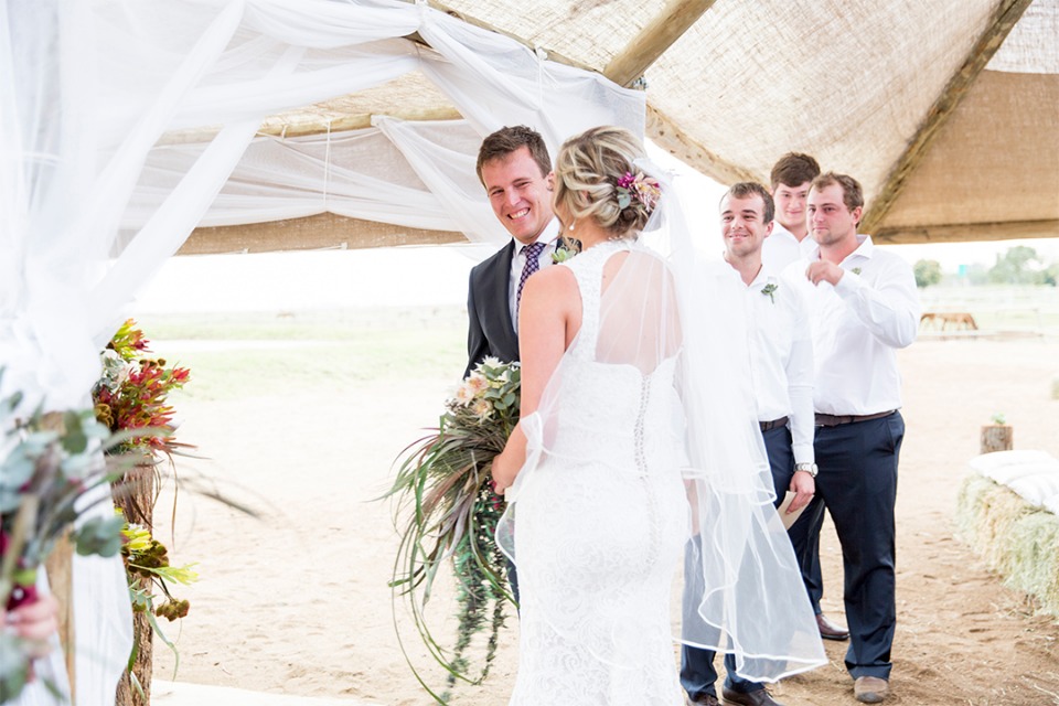 cute groom excited to see his bride