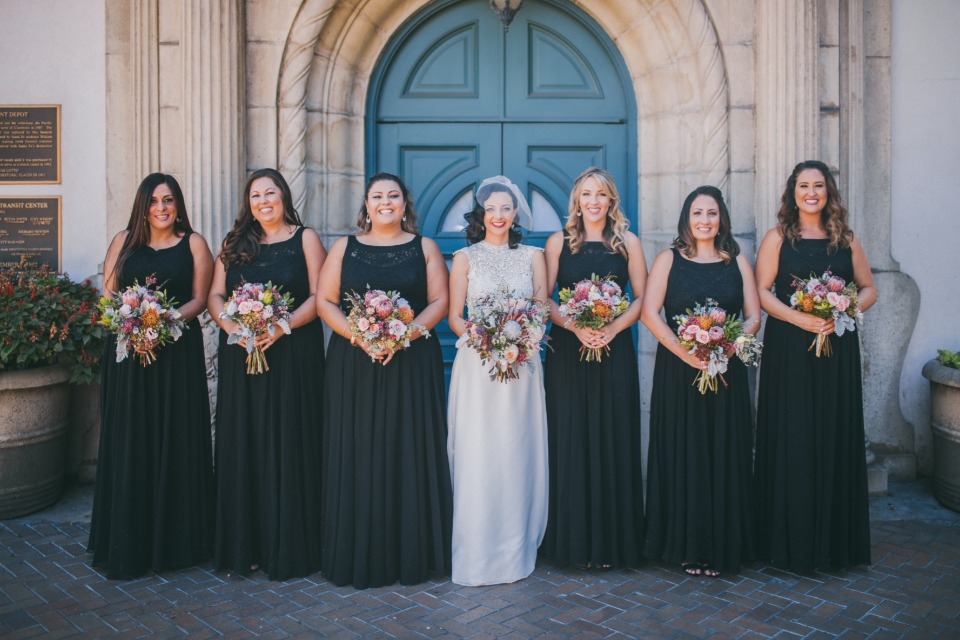 Bridesmaids in black dresses