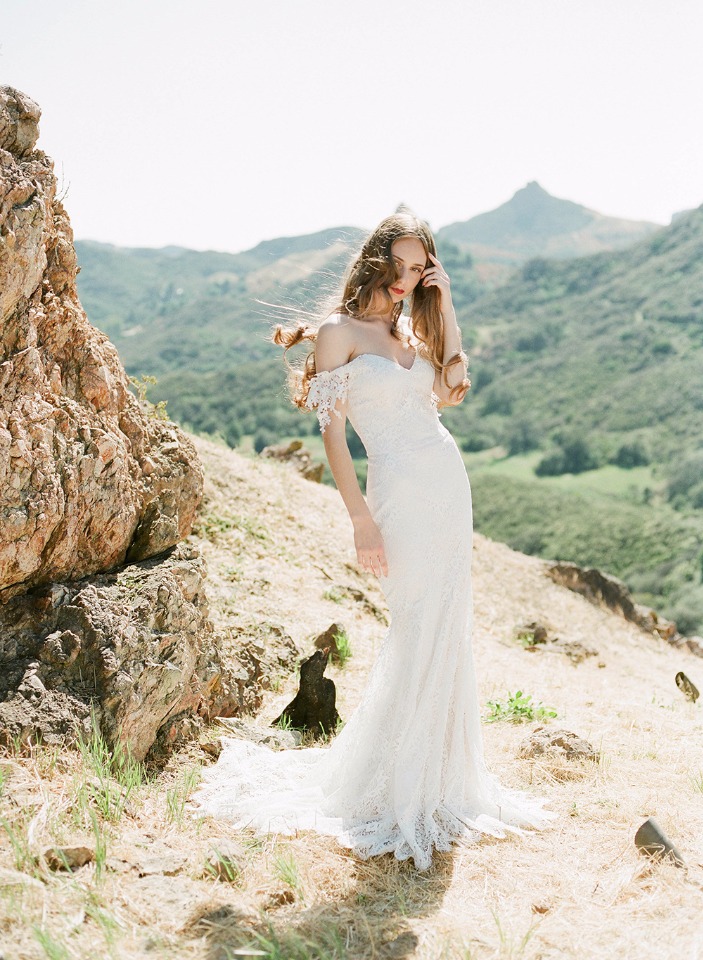 off the shoulder lace wedding gown made with Guipure lace