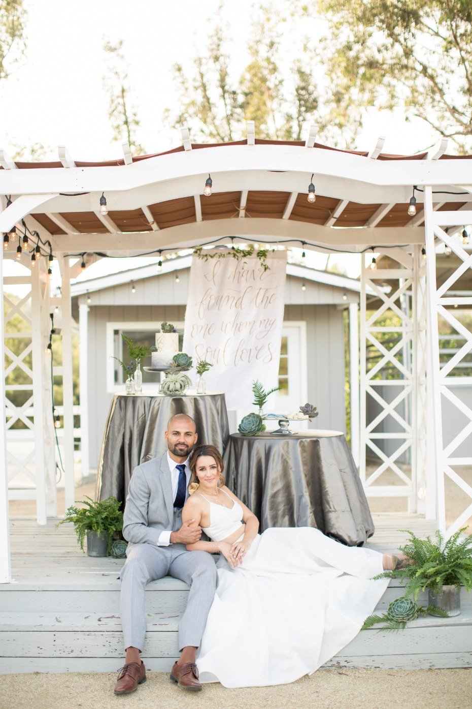 wedding cake table under a gazebo