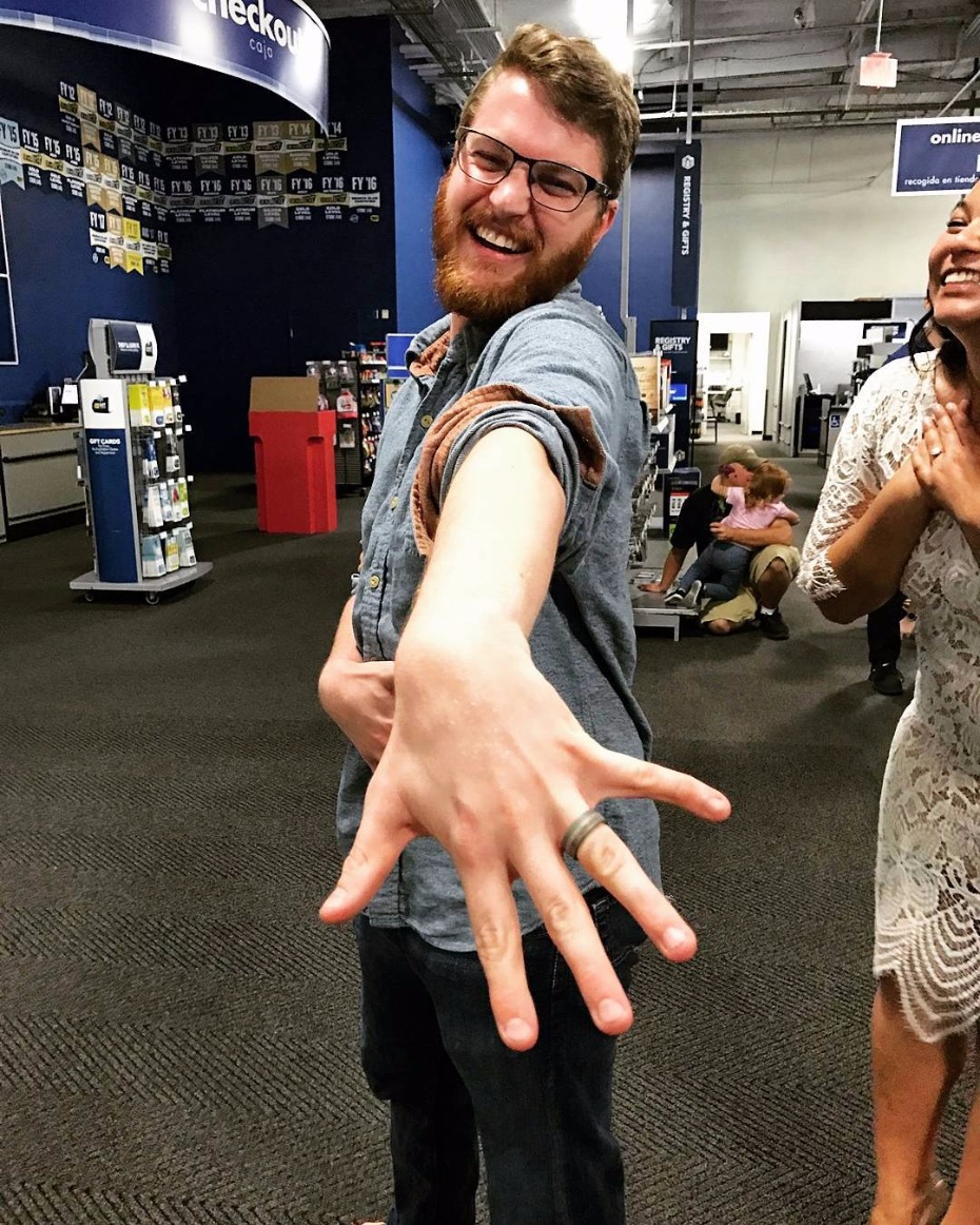 bride proposes to her man at Best Buy