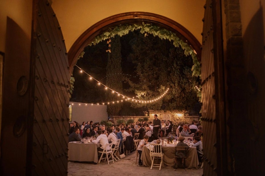 Patio reception under twinkle lights