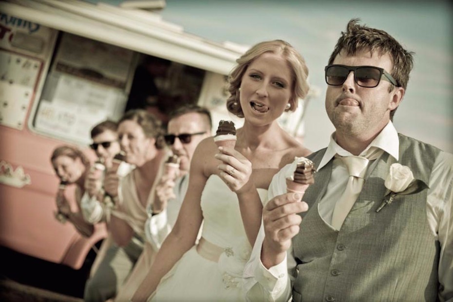 bride and groom eating ice cream