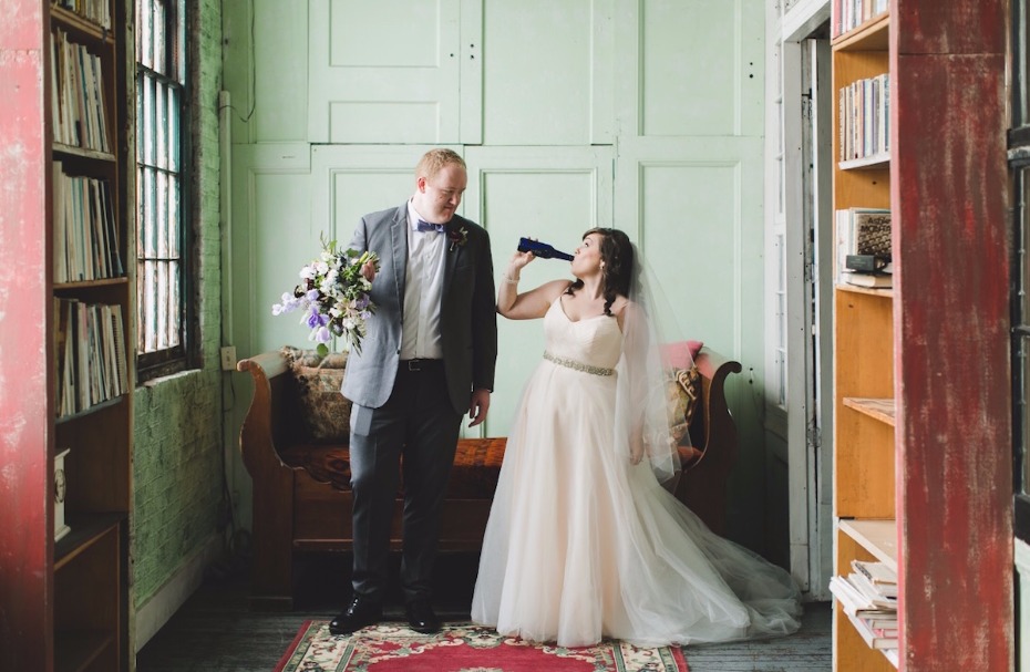 bride and groom drinking