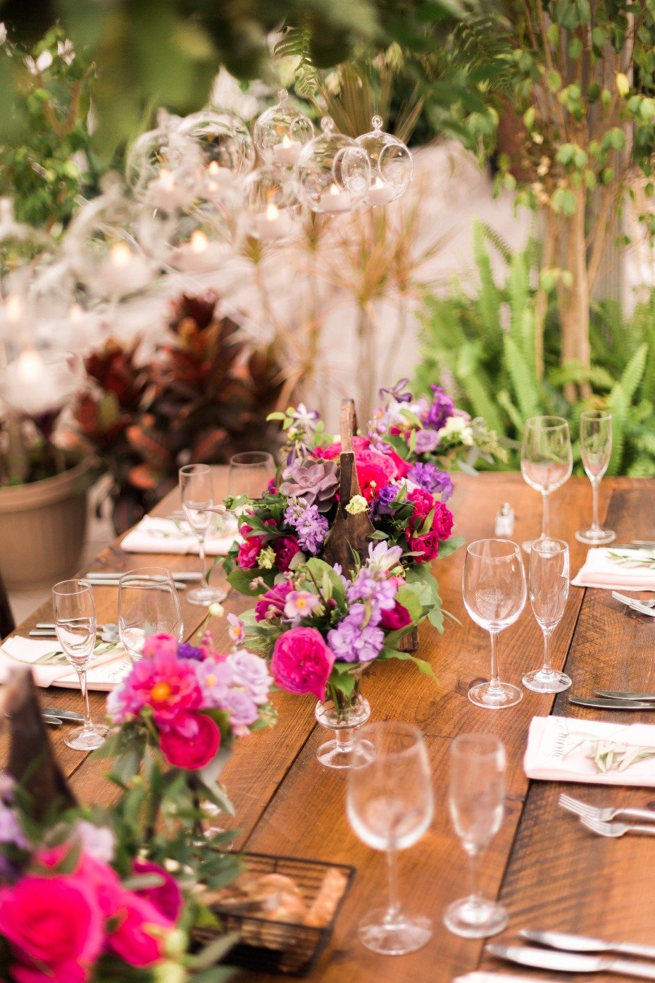 fuchsia and purple wedding floral centerpieces