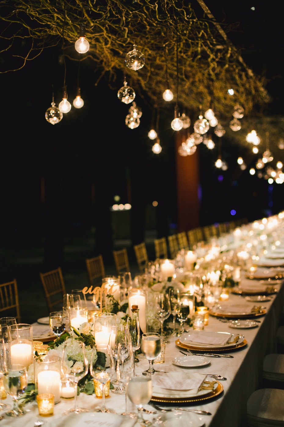 elegant candle lit family style wedding table