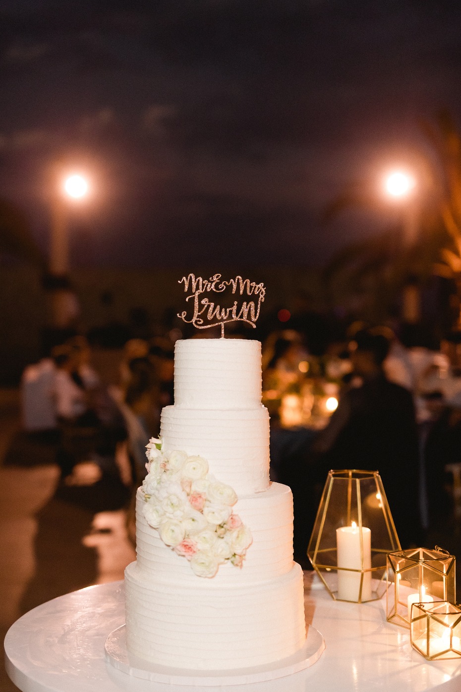 White wedding cake with sparkly topper