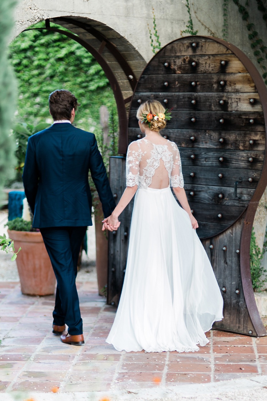 here come the bride and groom