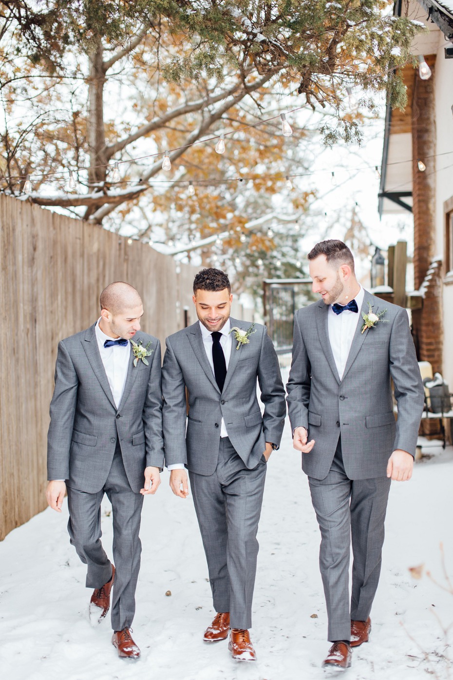 Grey suits and black ties