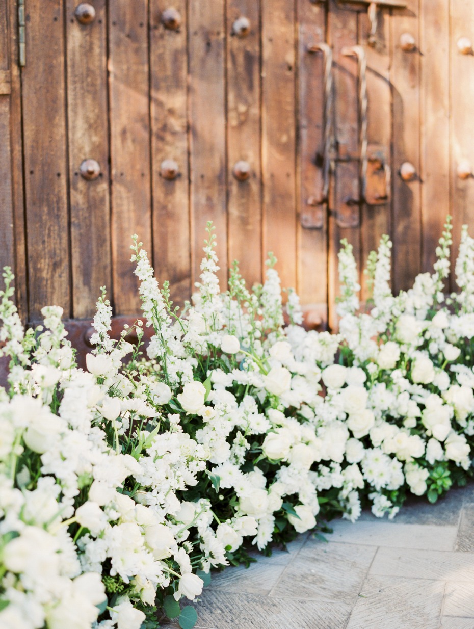 Unique floral filled ceremony backdrop