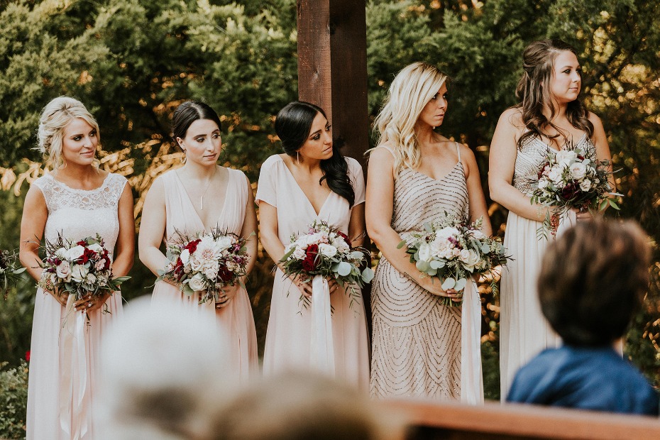 bridesmaids looking on