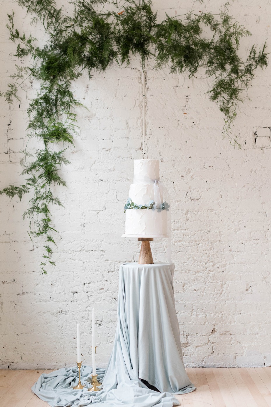 White and blue spring wedding cake