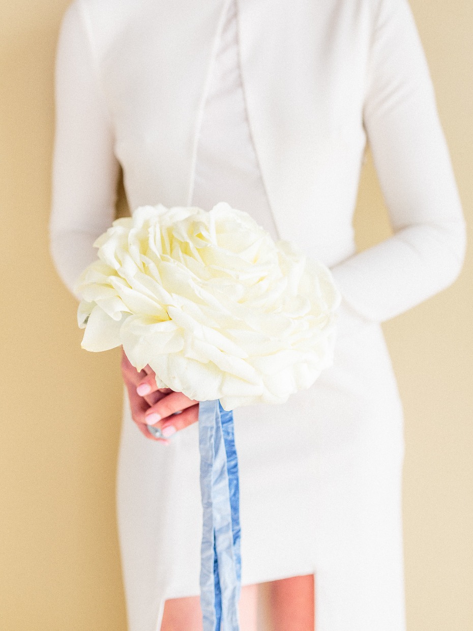 Giant white rose bouquet with blue ribbons