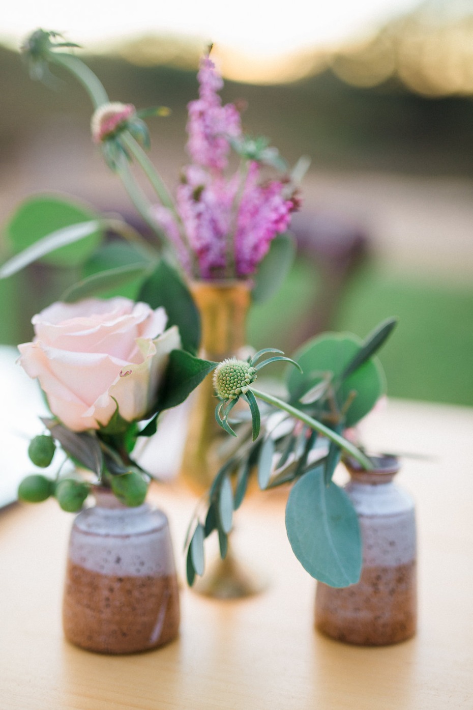 sweet ceramic bud vase centerpiece idea