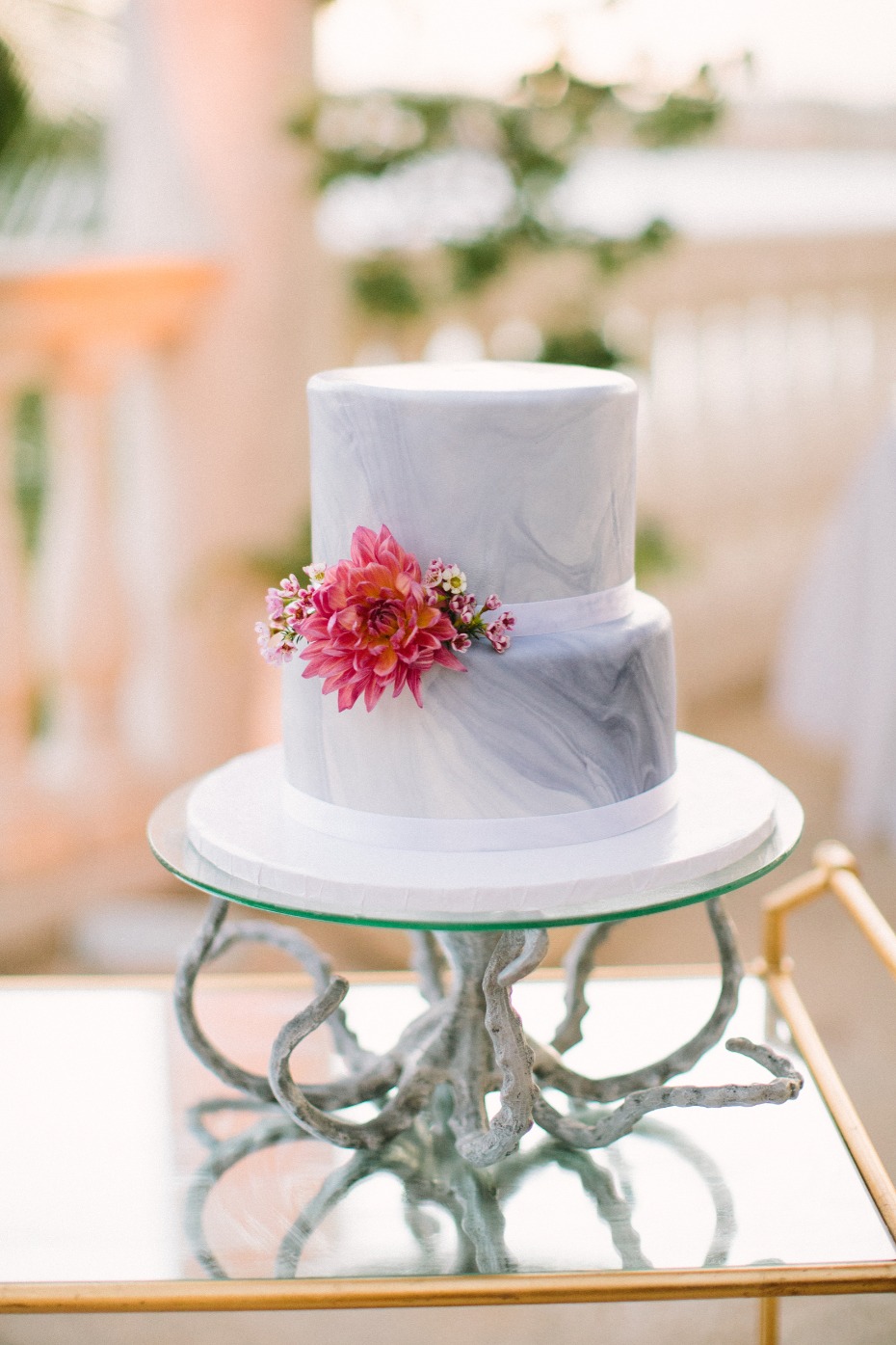 Marble wedding cake with octopus cake stand