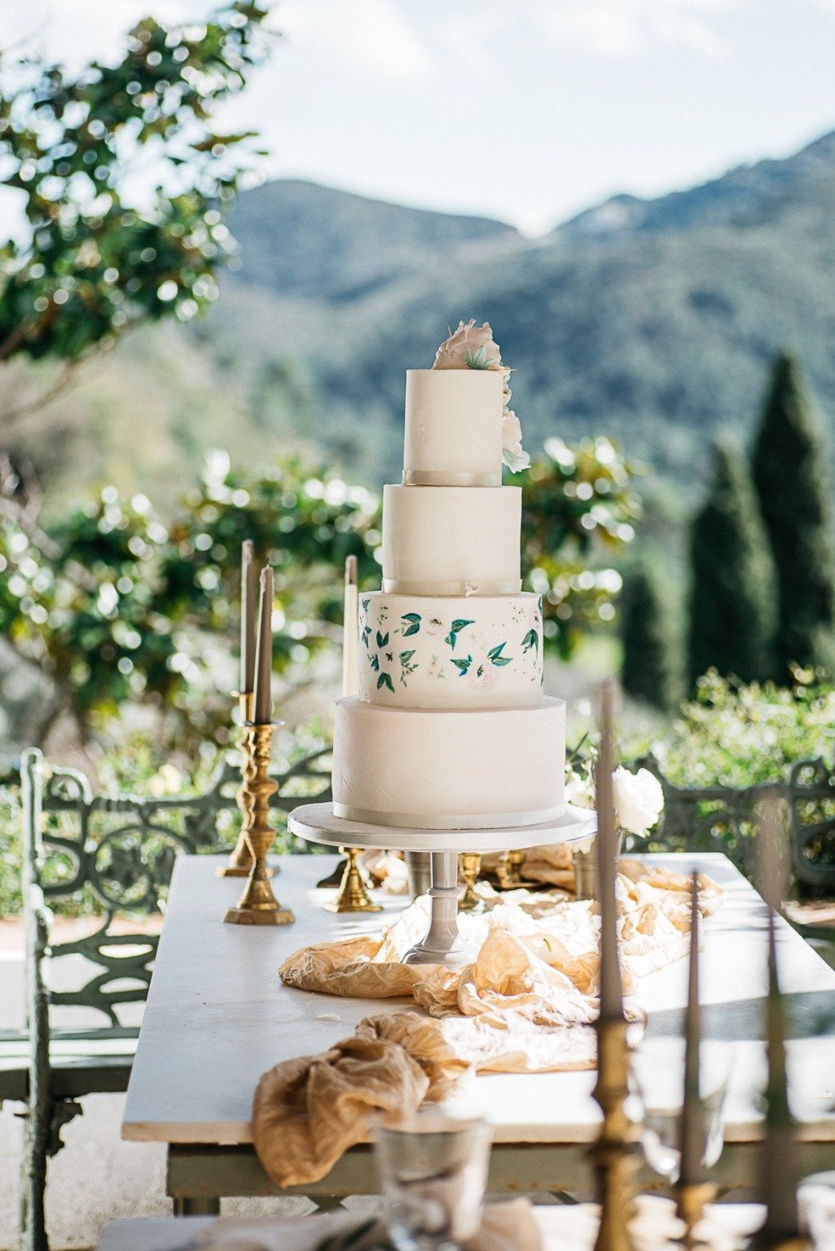 elegant wedding cake with painted flowers