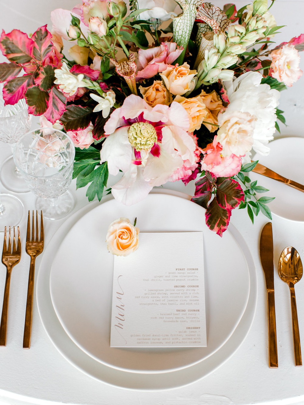 simple yet classic wedding place setting