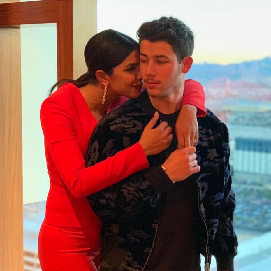 priyanka-chopra-and-nick-jonas-red-dress