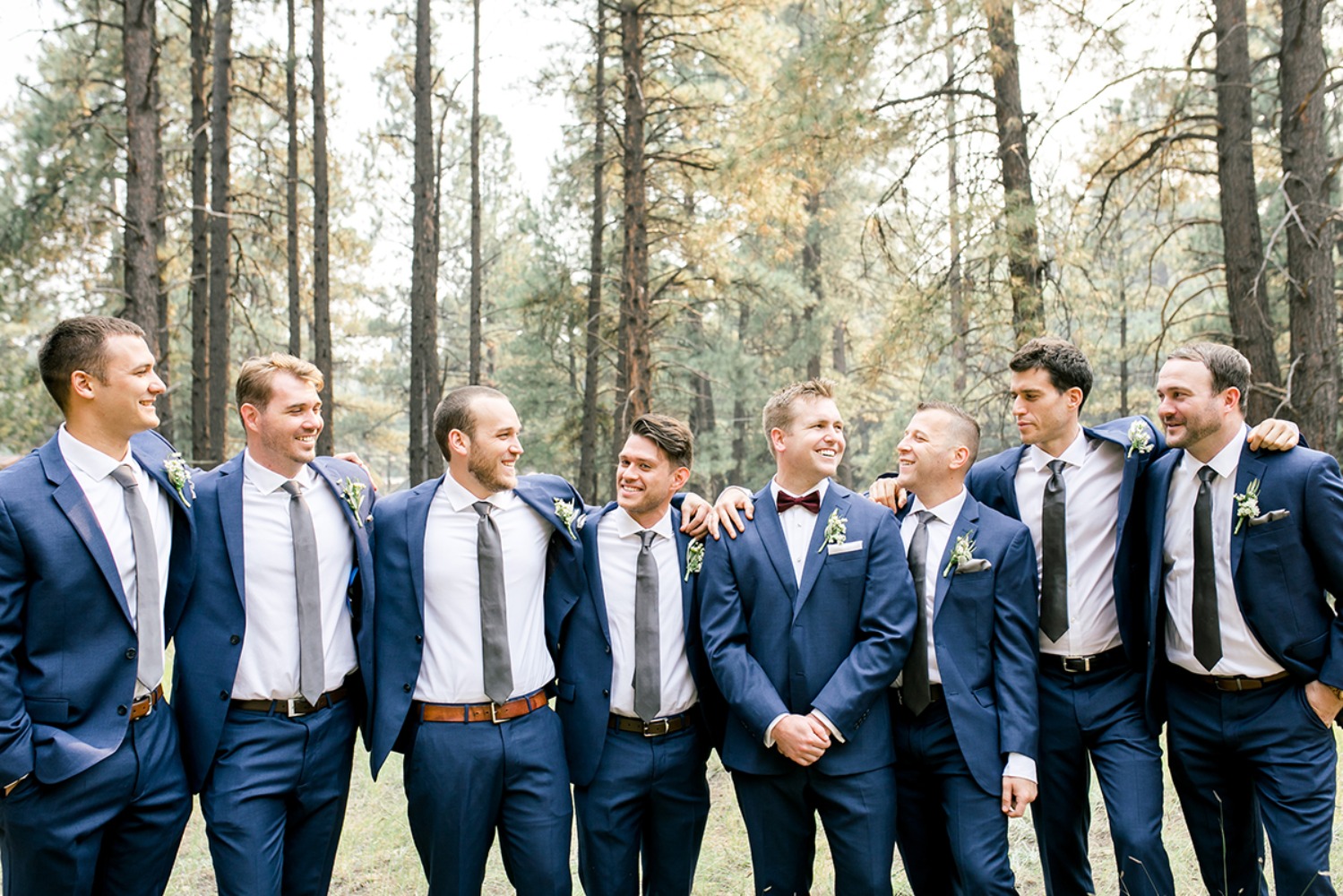 Groomsmen in navy blue suits