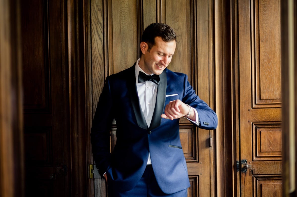 groom in navy blue suit