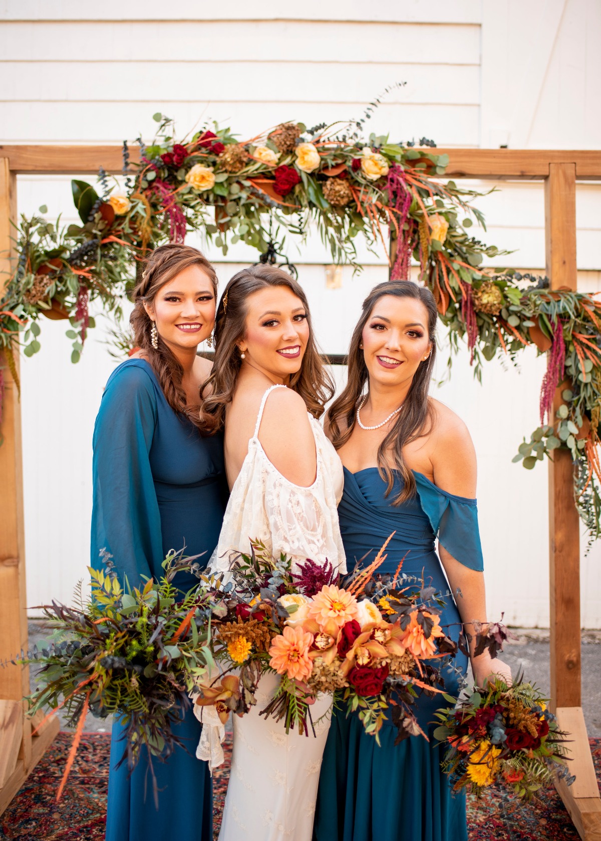 Fall wedding with blue bridesmaid dresses