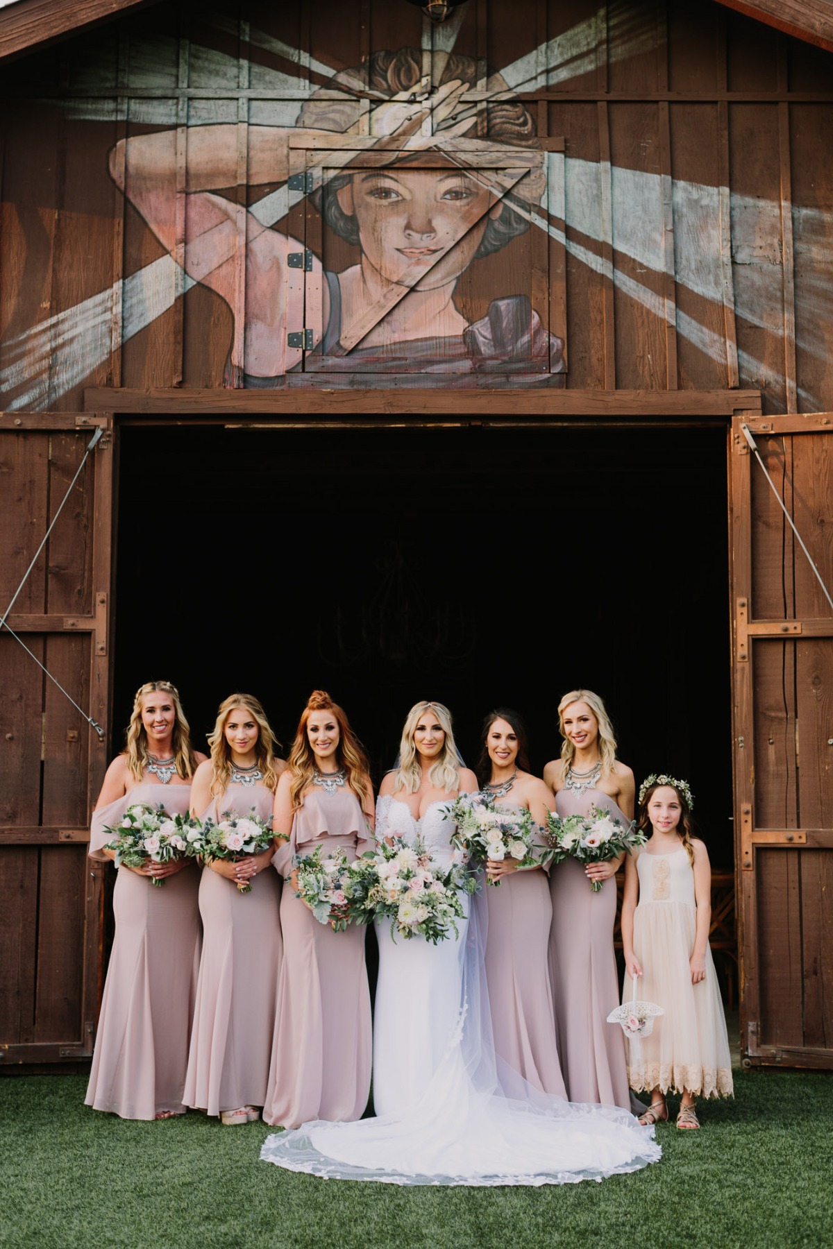 bridesmaids in dusty pink dresses