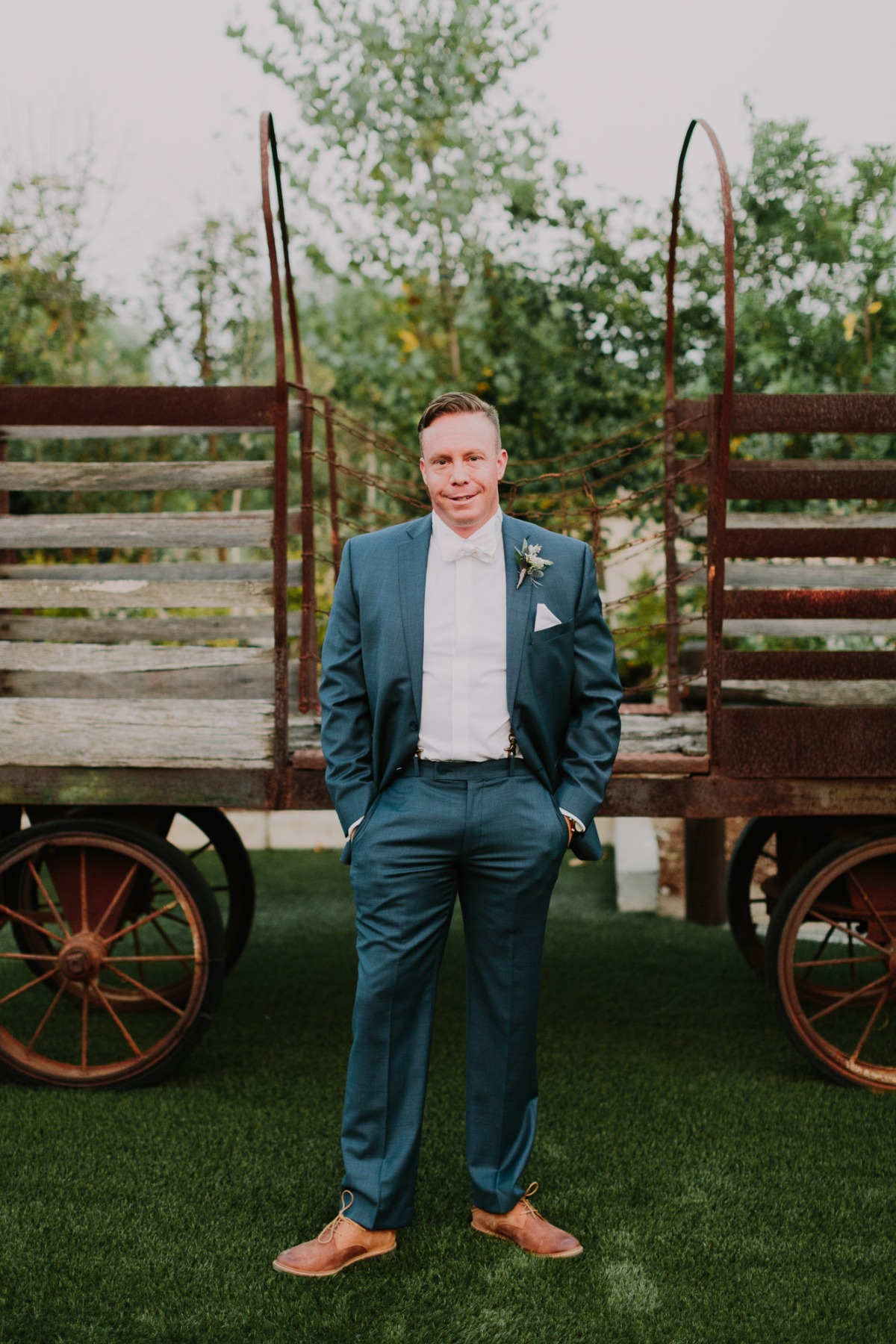 groom in blue grey suit