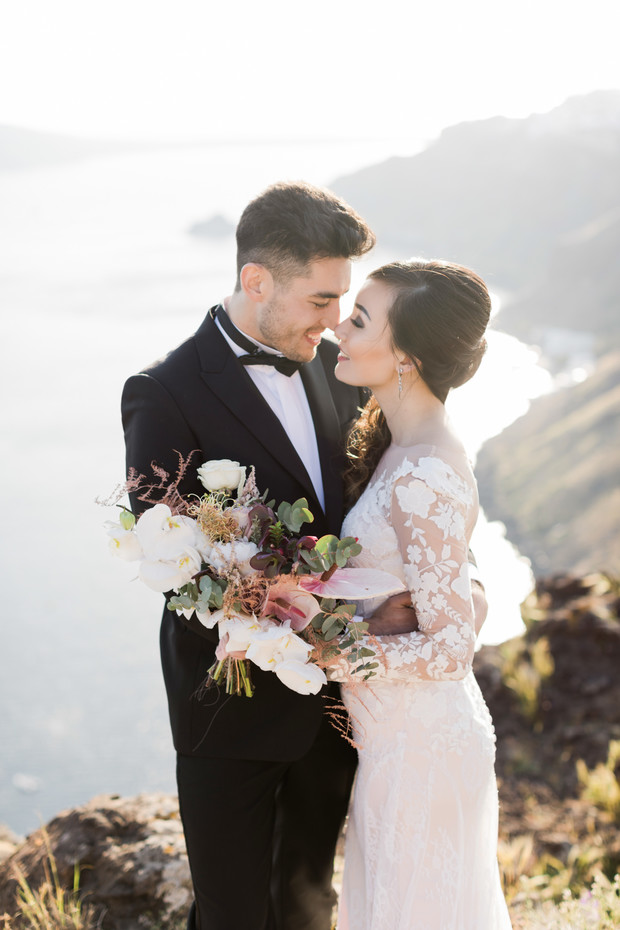 newlyweds in Santorini Greece