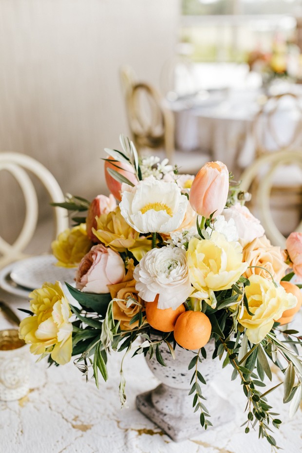 yellow and blush wedding centerpiece