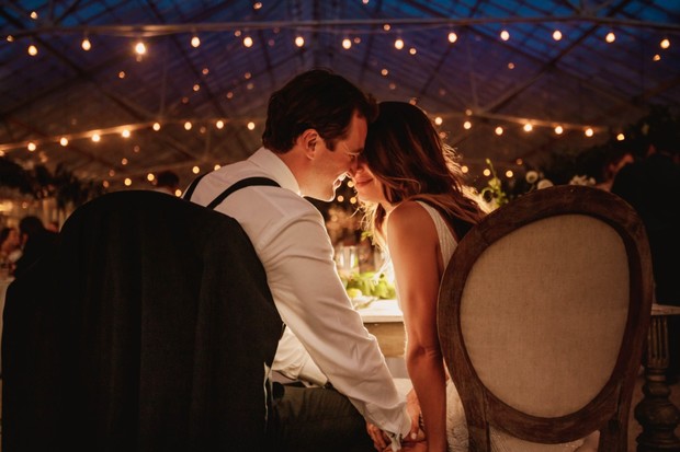 sweet wedding couple at their sweetheart table