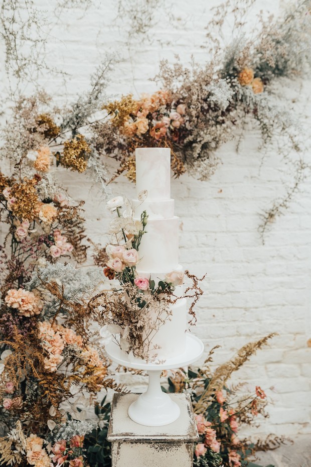 wedding cake with fresh flowers