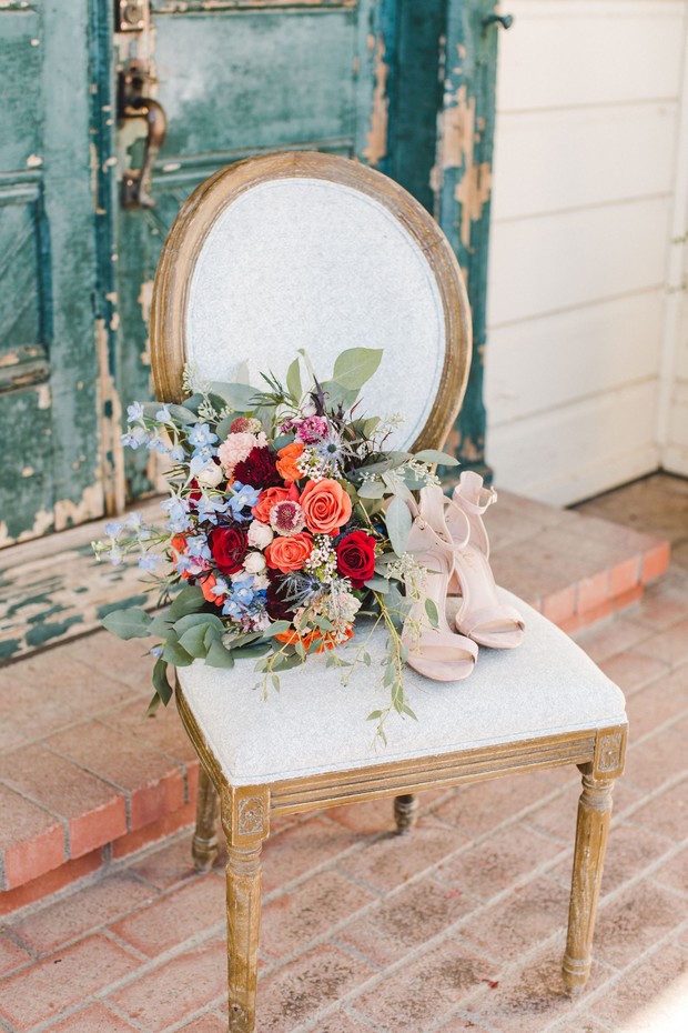 blue coral and red wedding bouquet