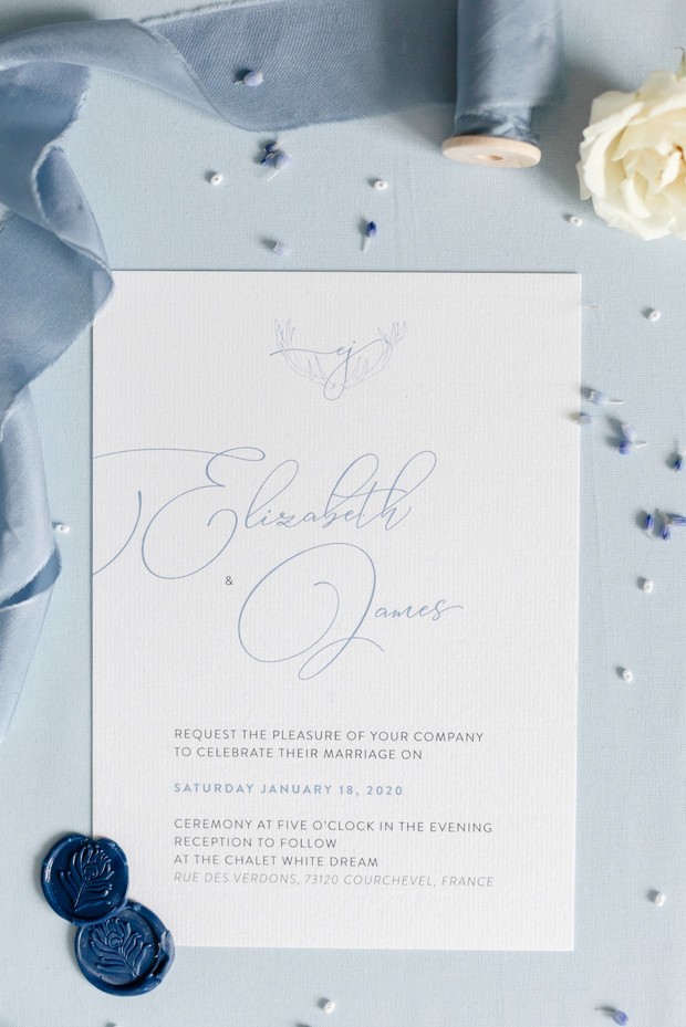 blue calligraphy wedding invitation
