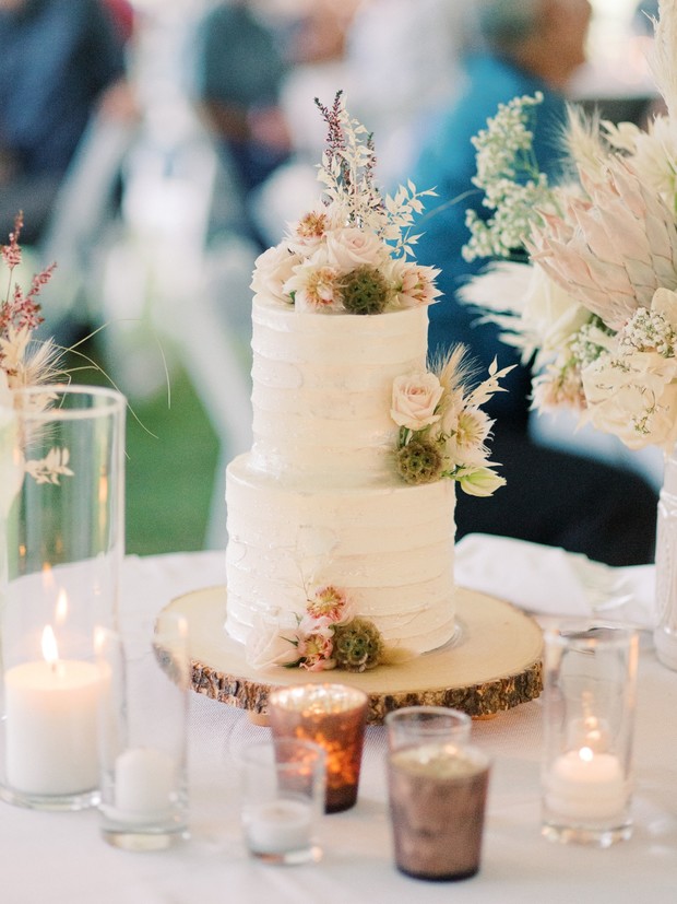 dried floral topped wedding cake