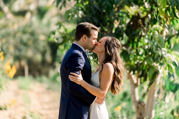 first look wedding kiss