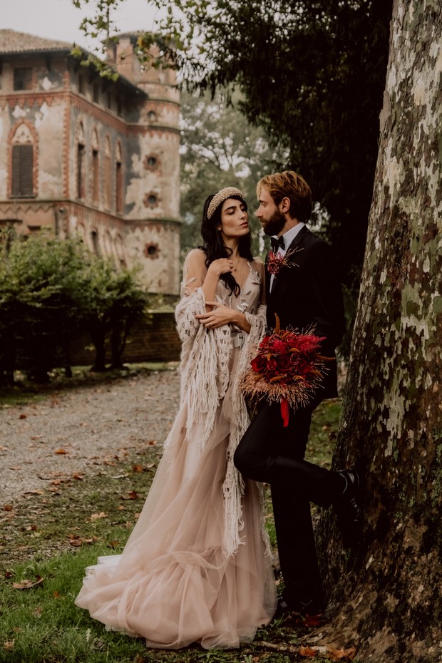 dreamy blush wedding red with red bouquet